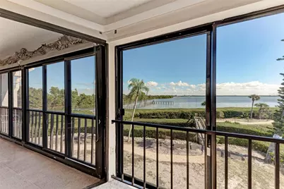 3805 E Bay Drive #309, Holmes Beach, FL 34217 - Photo 1