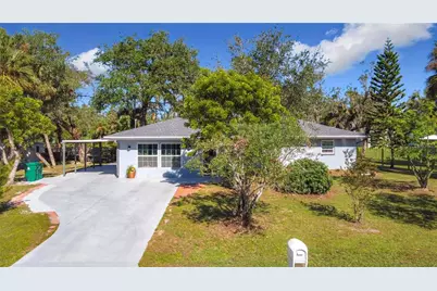 14454 NW Chamberlain Boulevard, Port Charlotte, FL 33953 - Photo 1