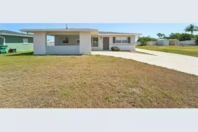 556 Lowell Avenue NW, Port Charlotte, FL 33952 - Photo 1
