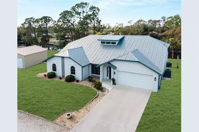 908 Tropical Circle NW, Port Charlotte, FL 33948 - Photo 1