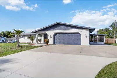 711 Forest Hill Lane NW, Port Charlotte, FL 33948 - Photo 1