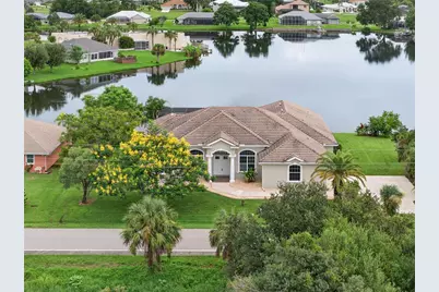 11600 SW Courtly Manor Drive, Lake Suzy, FL 34269 - Photo 1