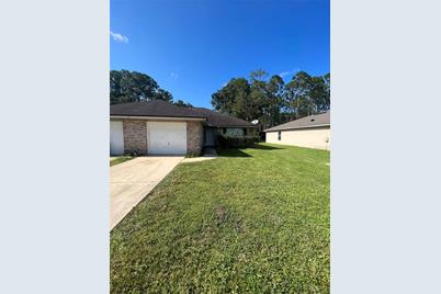 18 Regis Lane #B, Palm Coast, FL 32164 - Photo 1