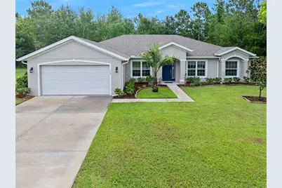 118 Bird Of Paradise Drive, Palm Coast, FL 32137 - Photo 1