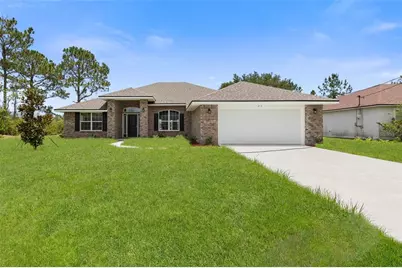 128 Bird Of Paradise Drive, Palm Coast, FL 32137 - Photo 1