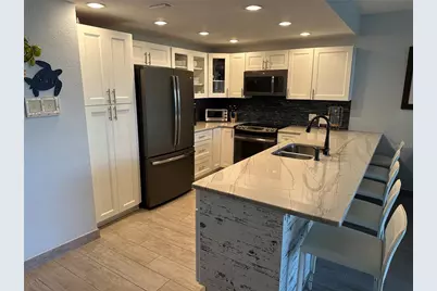 520 S Peninsula Avenue #1C1, New Smyrna Beach, FL 32169 - Photo 1