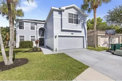 109 Burnt Pine Drive, Naples, FL 34119 - Photo 1