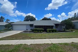 1959 Spanish Oaks Dr S, Palm Harbor, FL 34683 - Photo 1