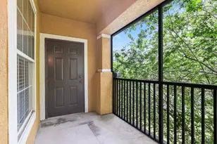 10108 Courtney Oaks Cir, Tampa, FL 33619 - Photo 1