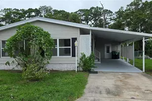 315 Papaya Cir, Barefoot Bay, FL 32976 - Photo 1