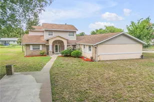 299 W Hickory Ave, Oak Hill, FL 32759 - Photo 1