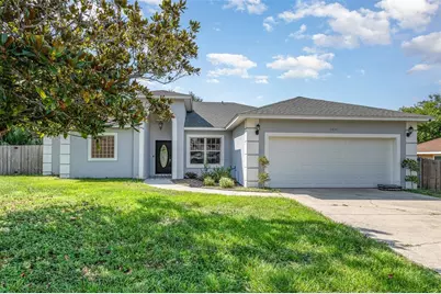 14317 Raintree Boulevard, Grand Island, FL 32735 - Photo 1