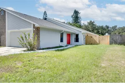 4486 Goldenrain Court, Orlando, FL 32808 - Photo 1