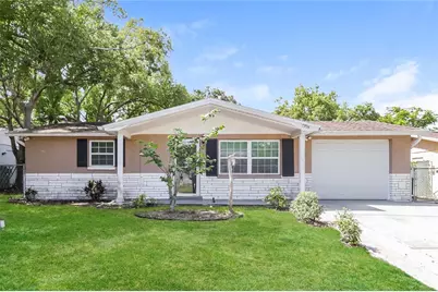 7704 Birchwood Drive, Port Richey, FL 34668 - Photo 1