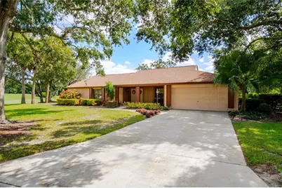 7203 Woodville Crescent, Orlando, FL 32819 - Photo 1