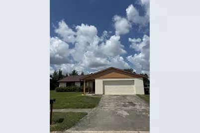 10719 Lazy Lake Drive, Orlando, FL 32821 - Photo 1