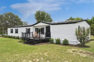 11435 S Em En El Grove Rd, Leesburg, FL 34788 - Photo 1