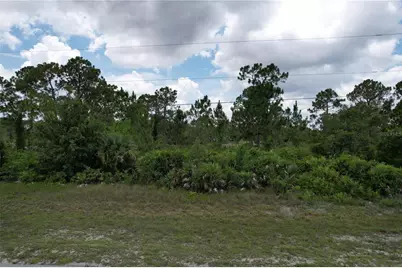 1056 Jaguar Boulevard, Lehigh Acres, FL 33974 - Photo 1