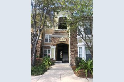 10108 Courtney Oaks Circle #203, Tampa, FL 33619 - Photo 1