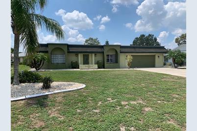 1717 N Pebble Beach Drive, Sun City Center, FL 33573 - Photo 1