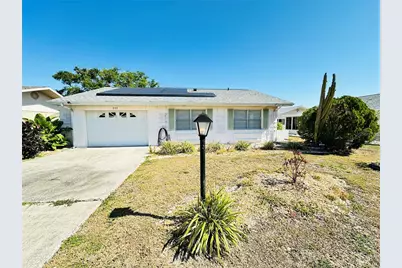 203 Rickenbacker Drive, Sun City Center, FL 33573 - Photo 1