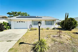 203 Rickenbacker Dr, Sun City Center, FL 33573 - Photo 1