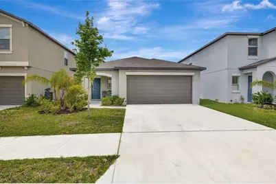 7225 Ronnie Gardens Court, Tampa, FL 33619 - Photo 1