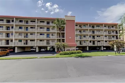 9490 Harbor Greens Way #303, Seminole, FL 33776 - Photo 1