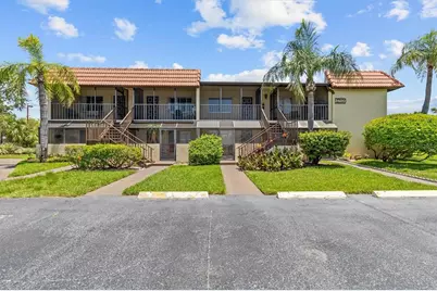 2420 Winding Creek Boulevard #209, Clearwater, FL 33761 - Photo 1