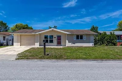 7735 Foxbloom Drive, Port Richey, FL 34668 - Photo 1