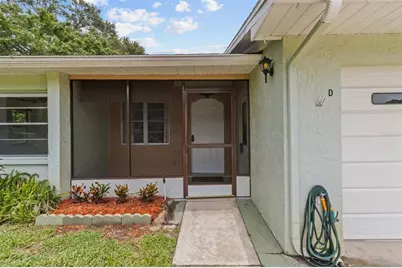 1163 Orange Tree Circle W #D, Palm Harbor, FL 34684 - Photo 1