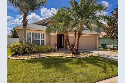 30326 Stapleton Street, Wesley Chapel, FL 33545 - Photo 1