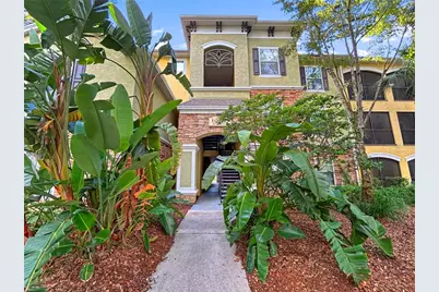 10105 Courtney Palms Boulevard #303, Tampa, FL 33619 - Photo 1