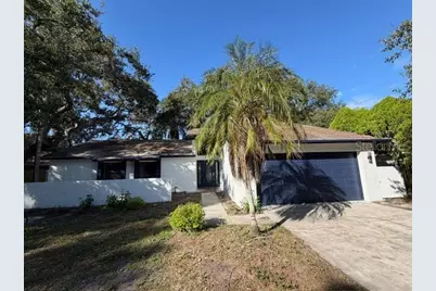 933 Woodland Drive, Palm Harbor, FL 34683 - Photo 1