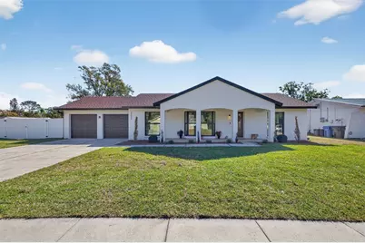 13933 Cherry Creek Drive, Tampa, FL 33618 - Photo 1