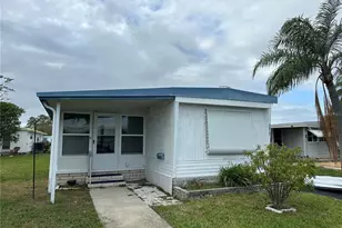 7028 Mt Jupiter Dr NE, Saint Petersburg, FL 33702 - Photo 1