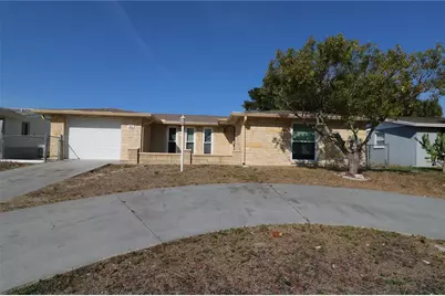 7825 Birchwood Drive, Port Richey, FL 34668 - Photo 1