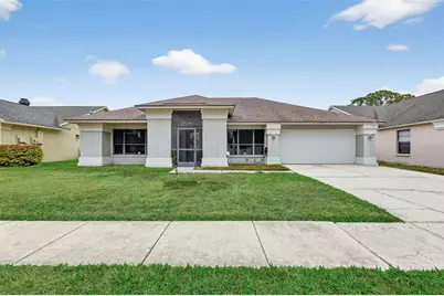 9410 Pebble Glen Avenue, Tampa, FL 33647 - Photo 1