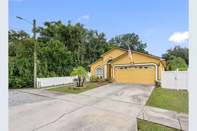 10407 N Woodmere Road, Tampa, FL 33617 - Photo 1