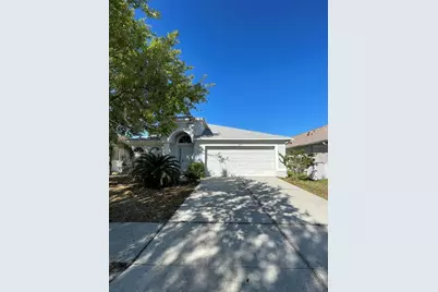 7445 Tower Bridge Drive, Wesley Chapel, FL 33545 - Photo 1