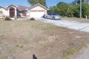 706 Canterbury Cir, Lehigh Acres, FL 33974 - Photo 1