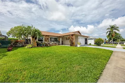 8220 Tarsier Avenue, New Port Richey, FL 34653 - Photo 1