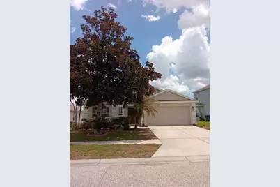 7724 Outerbridge Street, Wesley Chapel, FL 33545 - Photo 1
