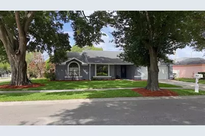 7667 Gramercy Drive, Orlando, FL 32818 - Photo 1
