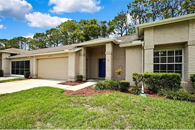 7423 Woodhollow Road, Spring Hill, FL 34606 - Photo 1