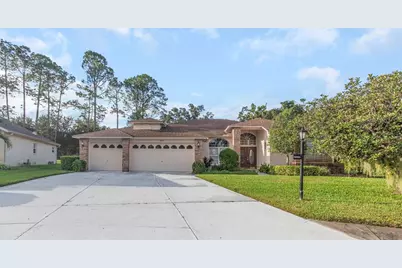 9807 Oakwood Hills Court, New Port Richey, FL 34655 - Photo 1