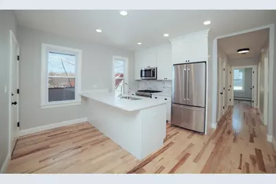 10 Duffley Ct #1, Boston, MA 02467 - Photo 1