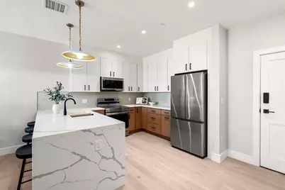 27 Guild Street #102, Boston, MA 02119 - Photo 9