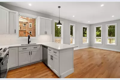 123-125 Centre St #TH6, Boston, MA 02124 - Photo 1