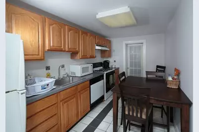 7 Harvard Square #4B, Brookline, MA 02445 - Photo 1